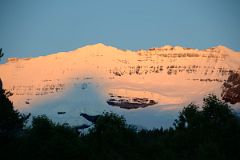 05 First Rays Of Sunrise On Mount Victoria From Lake Louise Village.jpg